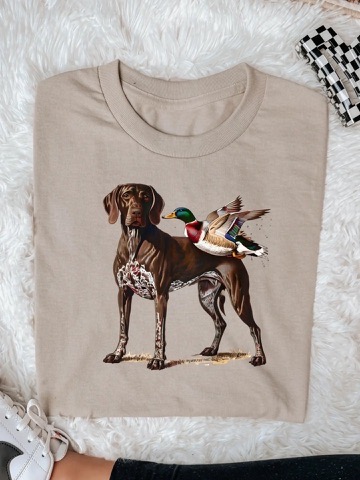 Beige Bird Dog T-shirt with brown hunting dog and mallard duck graphic.